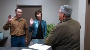 Erin McFadden (left) and Charlene Beane (Center) are sworn-in by Atlantic Mayor Dave Jones. 