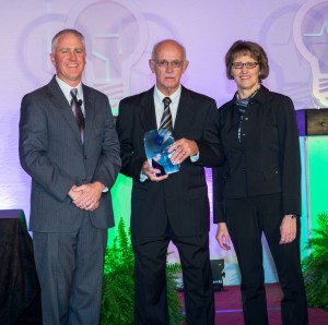 Roger Sandhorst (center) was presented with his Iowa Hospital Association (IHA) Hospital Hero award by Scott Curtis, IHA Board Chairman, and Pat Markham, CEO of Cass County Memorial Hospital, at this fall’s IHA Annual Meeting in Des Moines.