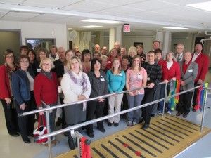 Pictured at the visit are Jane Kay, Tracy Milius, Becky Zinke, Ashley Williams, Erin Johnson, Ryan Legg, Carole Schuler, Dolly Bergmann, Pat McCurdy, Nedra Perry, Pat Markham, Mike Rohde, Whitney Welp, Nicole Schweigert, Sue Muri, Connie Wailes, Sara Nelson, Julie May, Christie Ladd, Haley Kickland, Rebecca Bowen, JoAnn Mueller, Steve Lewis, Bill Saluk, Doreen Ross, Russell Joyce, Rich Perry, Rita Willmont, and Linda Hemminger.    