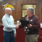 Shawn Shouse receives his plaque from the Mayor. 