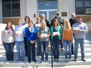 Nonprofit representatives receiving grant awards.  1st row, left to right: Maddie Christensen, Bradley Nissen, Sandy Nissen, Audubon Tennis Association; Jenny Smith, Audubon Recreation Foundation; Genelle Deist, Friendship Home Association; Jill Hermansen and Bob Gust, Audubon Youth Softball/Baseball.  2nd row: Sandy Bauer, Exira Public Library; Pat Curtis, Audubon Downtown Revitalization Committee; Tom Nielsen, Secretary/Treasurer, Audubon County Community Foundation; Jonnie Meislahn, Vice Chair, Audubon County Community Foundation; Troy Wessel, Audubon Youth Softball/Baseball.