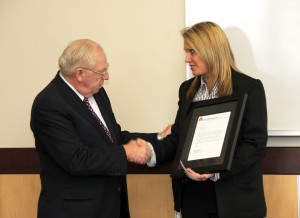Casey's President/CEO Robert Myers presents a letter of gratitude to Special Agent Shelby McCreedy. (DPS Photo)