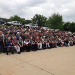 The Honor Flight veterans pose for a group picture before leaving Atlantic Monday evening. (Jim Field, photo)