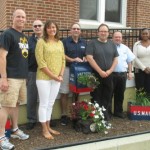 Pictured:  Bert Rose, employee, and Sharon Worthen, Post Master, Also pictured:  Image Building Committee: John Krogman, Ouida Wymer, Rich Perry, Gerald Brink, and Bill Saluk. 