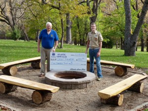 Grant Podhajsky recently completed his Eagle Scout project. He is shown accepting a donation to cover expenses from Merle  Elsberry,representing the Atlantic Lions Club.
