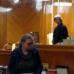 Leatha Slauson enters the courtroom prior to hear sentencing hearing. Judge Kathleen Kilnoski is behind her.