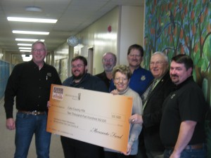 (from left to right) Dennis Kenealy (President, 4 Star Seed); Eric Miller (Atlantic FFA Advisor); Gary Miller (CAM FFA Advisor); Kevin Blair (Griswold FFA Advisor); Delbert Westphalen; Mike Lund (Sales Mgr.,4 Star Seed); Lana Westphalen (Center)