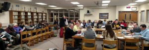 A large crowd packs the Atlantic High School Media Center. 