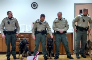 (Left) Cass County Dep. Kyle Quist, his partner Vader, and fellow K9 handlers & their partners.