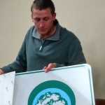 Atlantic Asst. Parks & Rec Director Seth Stasshelm with the new Tree City USA signs.