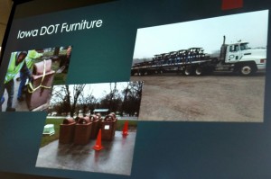 A Power Point image of the cement picnic tables and receptacles being loaded onto a flatbed trailer heading for Atlantic.  