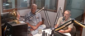 Steve Livengood (right) talks with KJAN's Jim Field about the rally. 