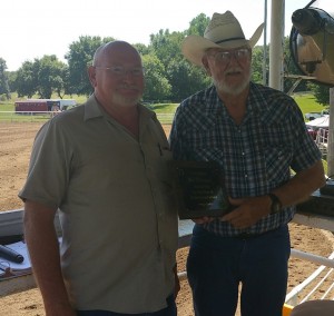 Larry Randell (Left) presents Bob Bebensee with the award (Photo courtesy Carol Bebensee South)