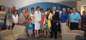 IWCC Atlantic Center Dir. Ann Pross cuts the ribbon for the Student Center as Chamber Ambassadors, college officials and others look on. (Ric Hanson/photo)