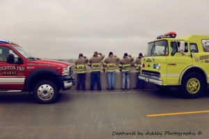 Members of the Marne Fire Department salute a piece of the World Trade Center as it goes by the Marne Interstate Exit to honor the fallen of 9/11. Photo courtest Ashley Haupert