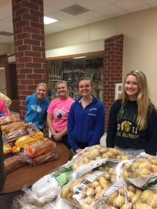 Several Silver Cord students came out to volunteer their time to help stock the mobile food pantry, pictured above are Bailey Schildberg, Ashley Freund, Tori Krogh, and Maddy Williams.