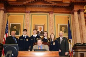 Pictured here are Sen. Jason Schultz, members of the AHSTW FFA chapter, their advisor Jeff Mayes (seated) and Rep. Steve Holt.