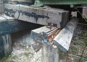 The damaged pile cap on a high truss bridge on Chicago Rd. (Cass County Engineer's photo)