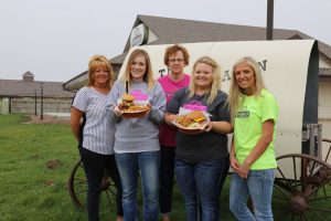 Chuckwagon Restaurant - (from L to R) Salli Nosbish; Kimberly Reha, owner; Marnell Jensen; Jessica Eblen and Chelsea Buckner pose in front of the Chuckwagon Restaurant in Adair.