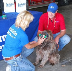 Shelly Jenkins gives a presentation on how to use the pet oxygen mask on her dog to area first responders.