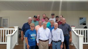 Governor Branstad (front center) and ICGA Director Curt Mether (front right) as well as members of the Harrison County Corn Growers.