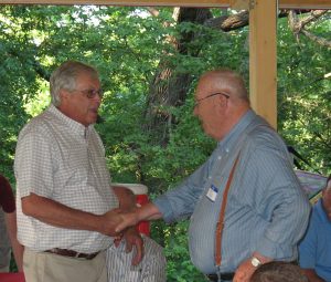 CADCO Executive Dir. Russell Joyce congratulates Dave Nichols 