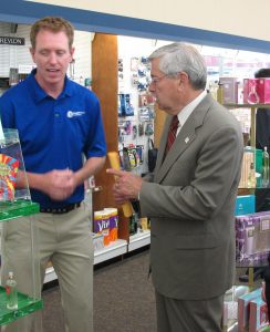 Rex Pharmacy owner Josh Borer (Left) W/Gov. Branstad