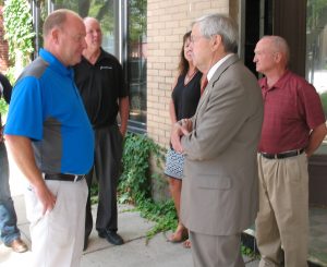 Old Whitney Hotel own/investor Mark Smith (Left), & Gov. Branstad