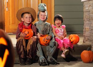 children-sitting-on-porch-halloween-safety-aaa